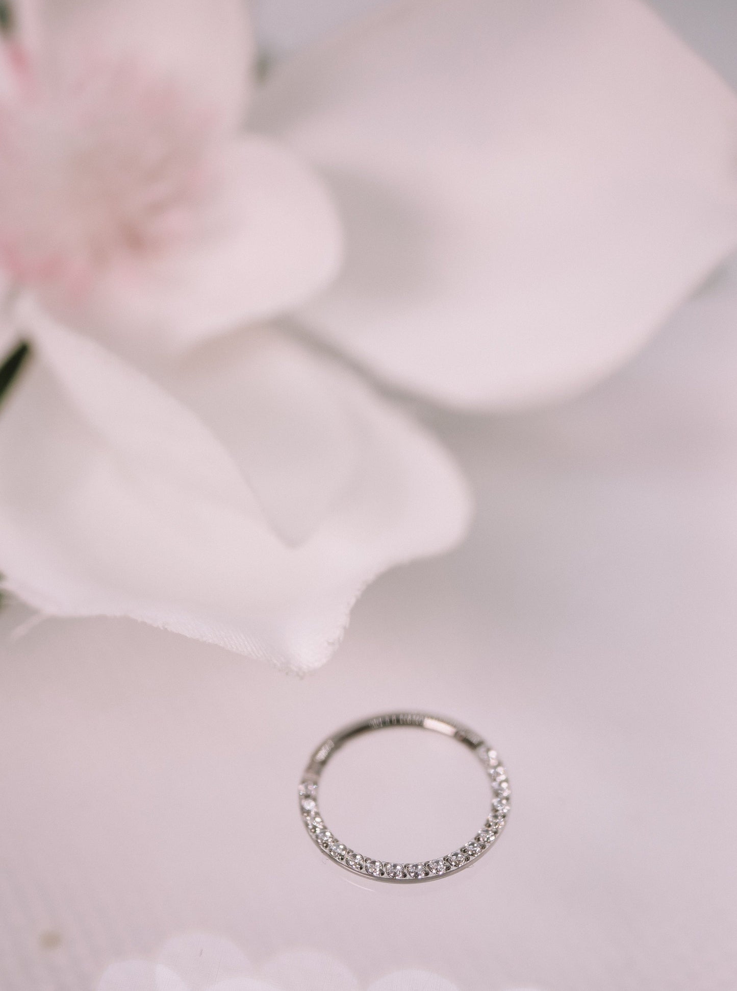 a classic yet upgraded daith, tragus or septum hoop featuring swarovski crystals