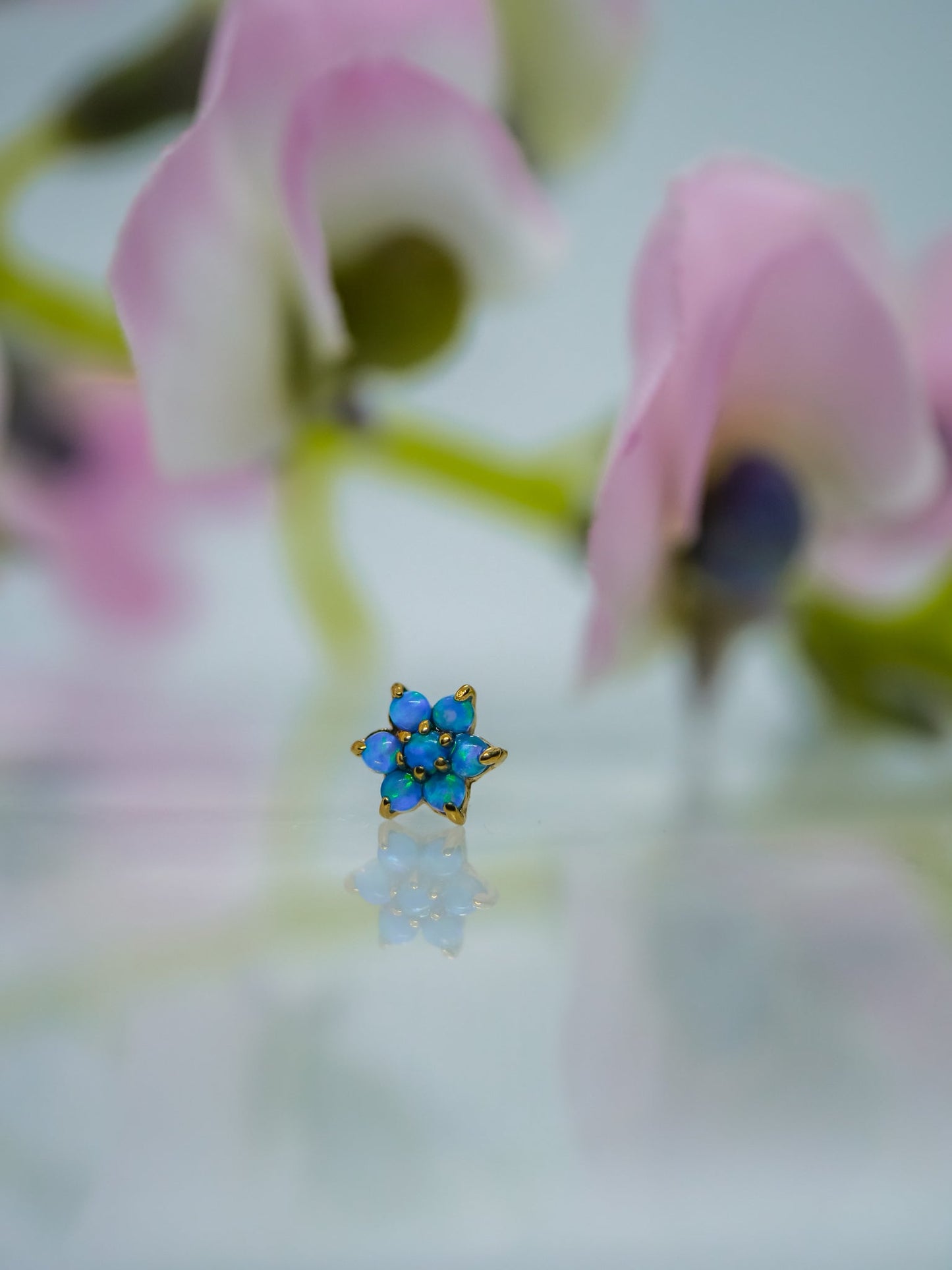 blue and green opals in gold flower threadless end