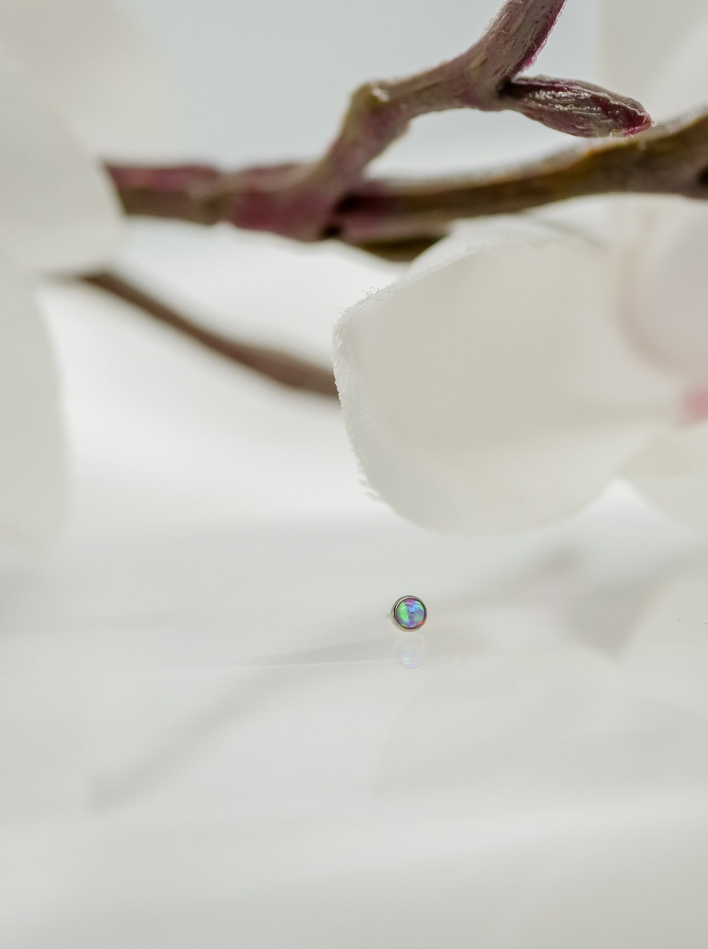 small pink opal threadless end is great for nostril piercing, lobes, forward helix, conch or cartilage