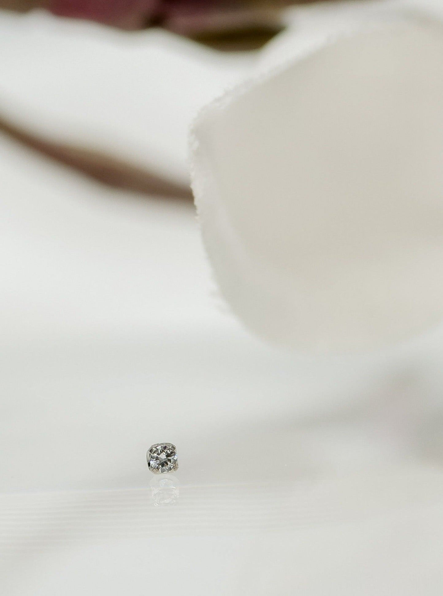 nostril, lobe, forward helix, conch and tragus prong set