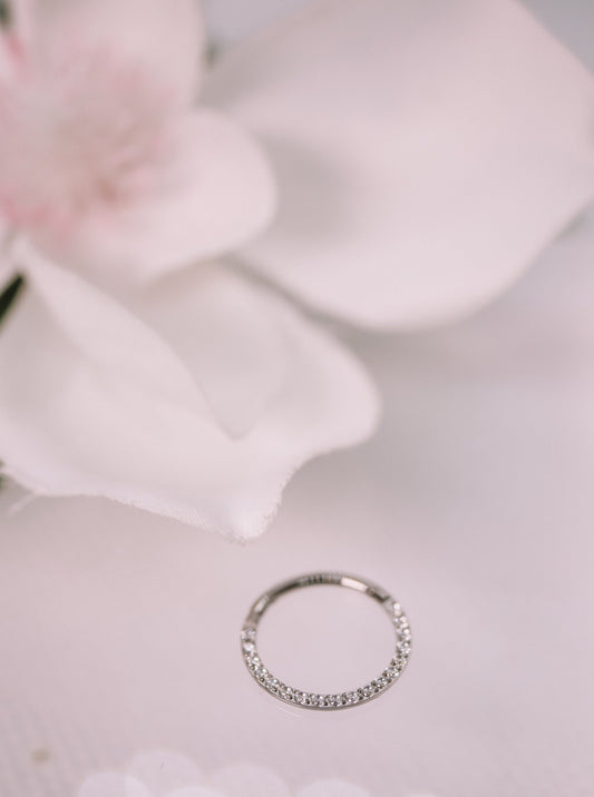 a classic yet upgraded daith, tragus or septum hoop featuring swarovski crystals